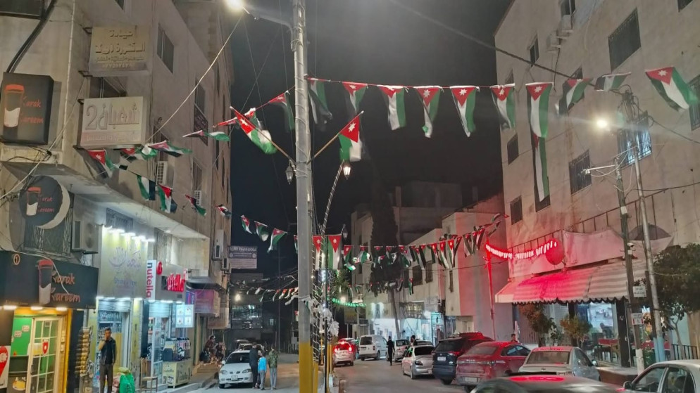 كفرنجة تستعد ليوم العلم بتوزيع الالاف من الاعلام